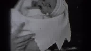 Middletown Pennsylvania (1975): A Woman Holding A Baby Covered With Blanket And