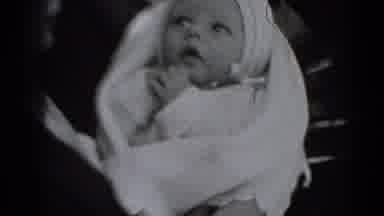 Middletown Pennsylvania (1975): Young Swaddled Wide Eyed Baby Looks Around And