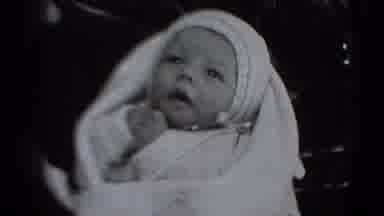 Middletown Pennsylvania (1975): A Small Infant Looking Upwards Then Sticking Its