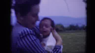Middletown Pennsylvania (1975): A Mother With Her Child On The First Days Of His