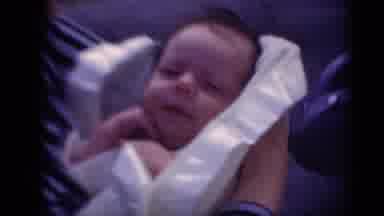 Middletown Pennsylvania (1975): Mom Covering Small Baby With White Cloth And Baby