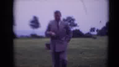 Middletown Pennsylvania (1975): Man In Double Breasted Suit Walks Through Field In