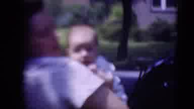 Middletown Pennsylvania (1975): A Man Holding A Little Baby In His Arms Very Tight