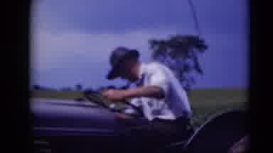 Middletown Pennsylvania (1975): Man Driving Tractor