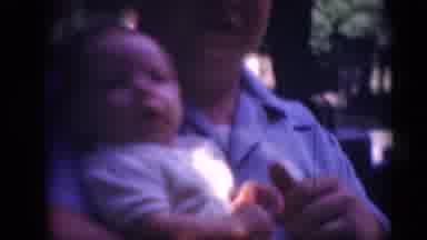 Middletown Pennsylvania (1975): Small White Baby With Grandpa Waving Hand In A