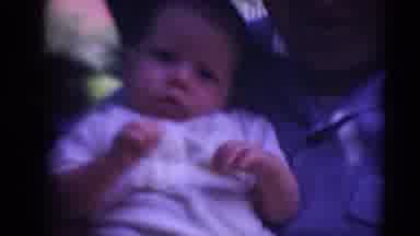 Middletown Pennsylvania (1975): Mother Holds Baby Close And Gives Kisses While