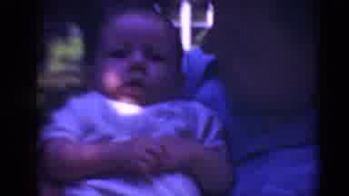 Middletown Pennsylvania (1975): A Man Holding A Little Baby