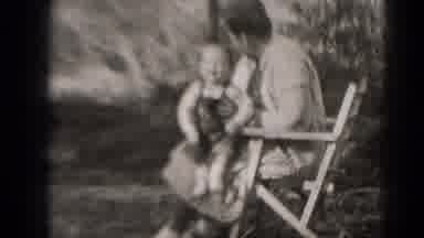 Middletown Pennsylvania (1975): Baby Boy In Moms Lap Ready To Roam Free In The
