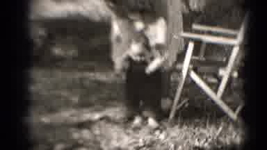 Middletown Pennsylvania (1975): Mother Helping Her Baby Learn To Walk Outside By A