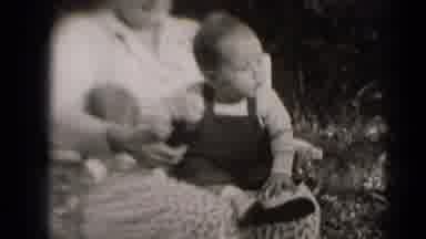 Middletown Pennsylvania (1975): A Mother And Son Play In The Garden All Areas