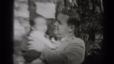 Middletown Pennsylvania (1975): A Man Is Enjoying Time With A Small Infant