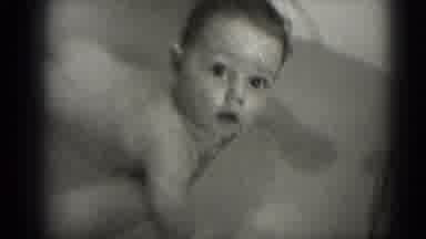 Middletown Pennsylvania (1975): Small Baby Plays In The Bathtub With Help From His