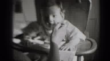 Middletown Pennsylvania (1975): A Cute Hungry Baby In A Highchair Being Spoon-Fed