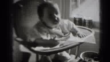 Middletown Pennsylvania (1975): Baby Being Fed Breakfast Or Lunch While Sitting In