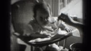 Middletown Pennsylvania (1975): Baby Is Being Feeded On A Sunny Day