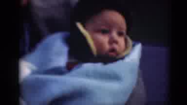 Middletown Pennsylvania (1975): Woman Wearing A Coat And Talking To Child In