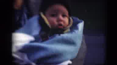 Middletown Pennsylvania (1975): Baby In Mom's Arms Outside In The Cold Bundled Up