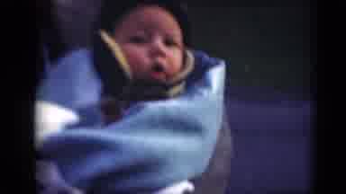 Middletown Pennsylvania (1975): 1950'S Mother Holding Baby Dressed In Winter