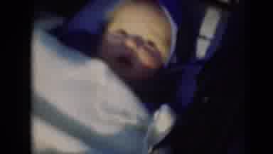 Middletown Pennsylvania (1975): Adorable Small Infant Lying Awake Bundled Up