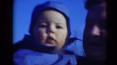 Middletown Pennsylvania (1975): Man Holds And Talks To Baby Picks Up Baby's Arm To