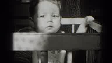 Middletown Pennsylvania (1975): A Baby Sitting And Eating In Their High Chair