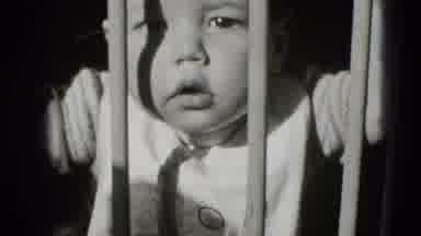 Middletown Pennsylvania (1975): A Baby Is Cute He Is Playing With His Gordian