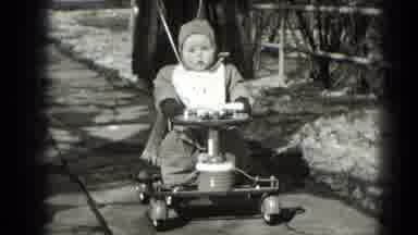 Middletown Pennsylvania (1975): A Little Baby Boy Riding In His Toy Car While