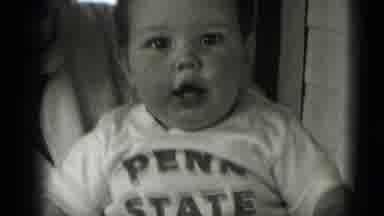 Middletown Pennsylvania (1975): A Child Is Playing And Laughing Shaking His Hands