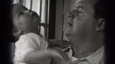 Middletown Pennsylvania (1975): Man And Small Child Play Then It Says "The End"