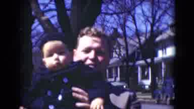 Middletown Pennsylvania (1975): Dad And Infant Son Say Hello To The Camera While