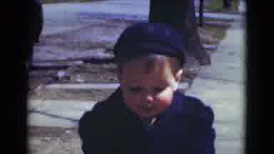 Middletown Pennsylvania (1975): Toddler In Blue Hat And Coat Standing Outside