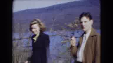 Middletown Pennsylvania (1975): Two Women Dressed In Dark Color And A Man Smoking