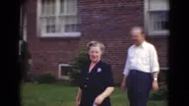 Middletown Pennsylvania (1975): A Man And Woman Walking Out Of A House Toward A