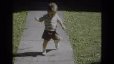 Middletown Pennsylvania (1975): Toddler Walking Down The Sidewalk And Wowing The