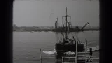 Middletown Pennsylvania (1975): Pair Of Tugboats Racing In Harbor On A Cloudy Day