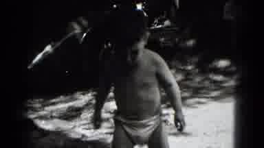 Middletown Pennsylvania (1975): Toddler With Short Dark Hair Walking Outdoors With