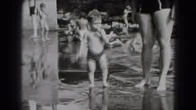 Middletown Pennsylvania-1975: A Child Being Watched For By A Parent While At Riverbank