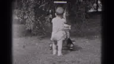 Middletown Pennsylvania (1975): A Little Boy Playing With His Toys In His Yard