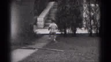 Middletown Pennsylvania (1975): Toddler Walking Around Pulling A Pull String Toy