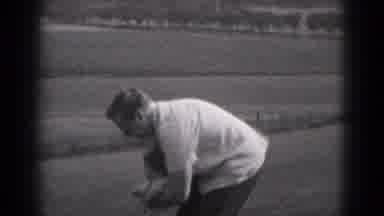 MIDDLETOWN PENNSYLVANIA-1975: Father Carries His Child Then Sets Him Down In The