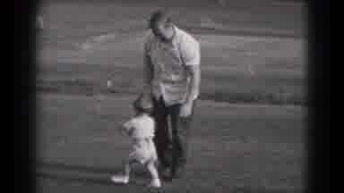 Middletown Pennsylvania (1975): Young Father Plays With His Child On The Lawn