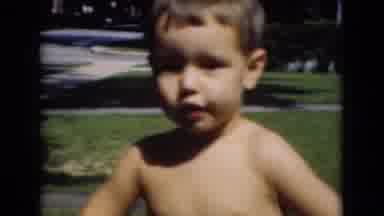 Middletown Pennsylvania-1975: Toddlers In Sunlit Backyard On Warm Spring Day