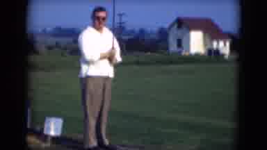 Middletown Pennsylvania (1975): A Man In A White Shirt And Brown Trousers Posing
