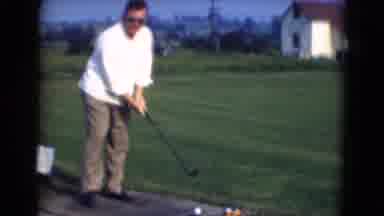 Middletown Pennsylvania (1975): A Man Practicing His Golf Swing On A Sunny Day