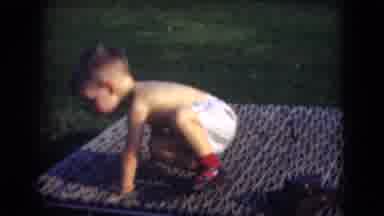 Middletown Pennsylvania (1975): Boy Toddler Sits Down In Garden In Vintage Home