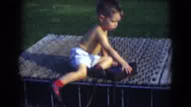 Middletown Pennsylvania (1975): Dad Playing Golf With Topless Boy Playing By The