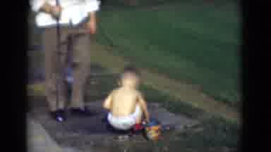 Middletown Pennsylvania (1975): A Father And Son Play Outside Together In The Sun