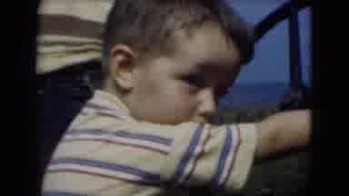 Middletown Pennsylvania (1975): Toddler Play Driving With Goat Nearby