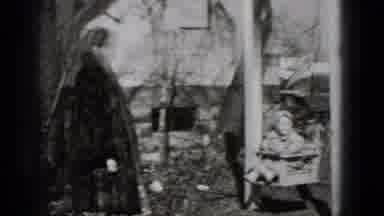Middletown Pennsylvania (1975): Baby In Wooden Swing Being Pushed By A Woman In A