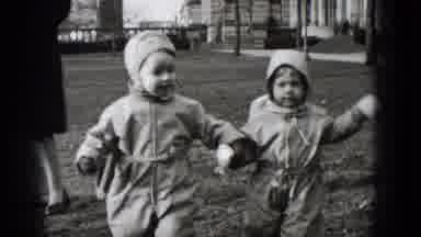 Middletown Pennsylvania-1975: Two Bundled Up Young Children Walking With Adults